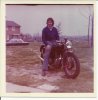 age 18, astride dads 1936 AJS.jpg